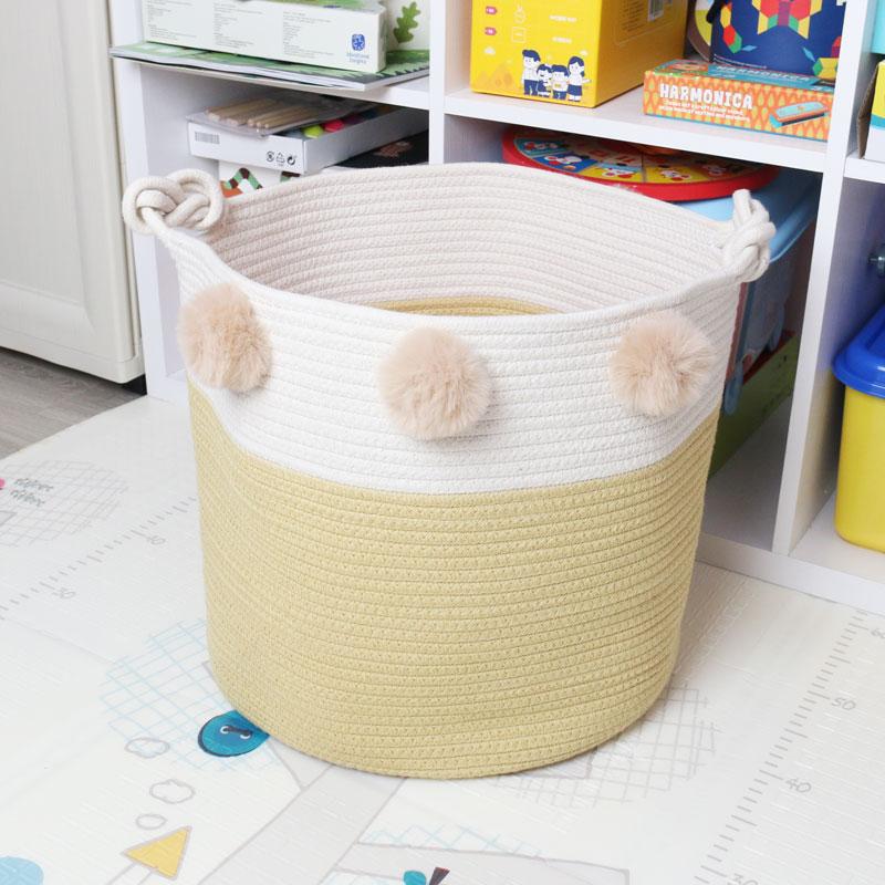 panier linge pour bebe avec pompons