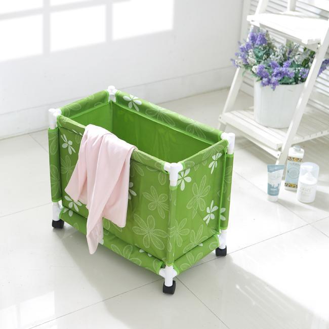 coffre à linge avec roulettes vert