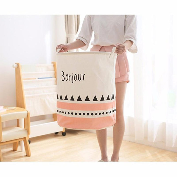 panier à linge pour enfant rose et blanc
