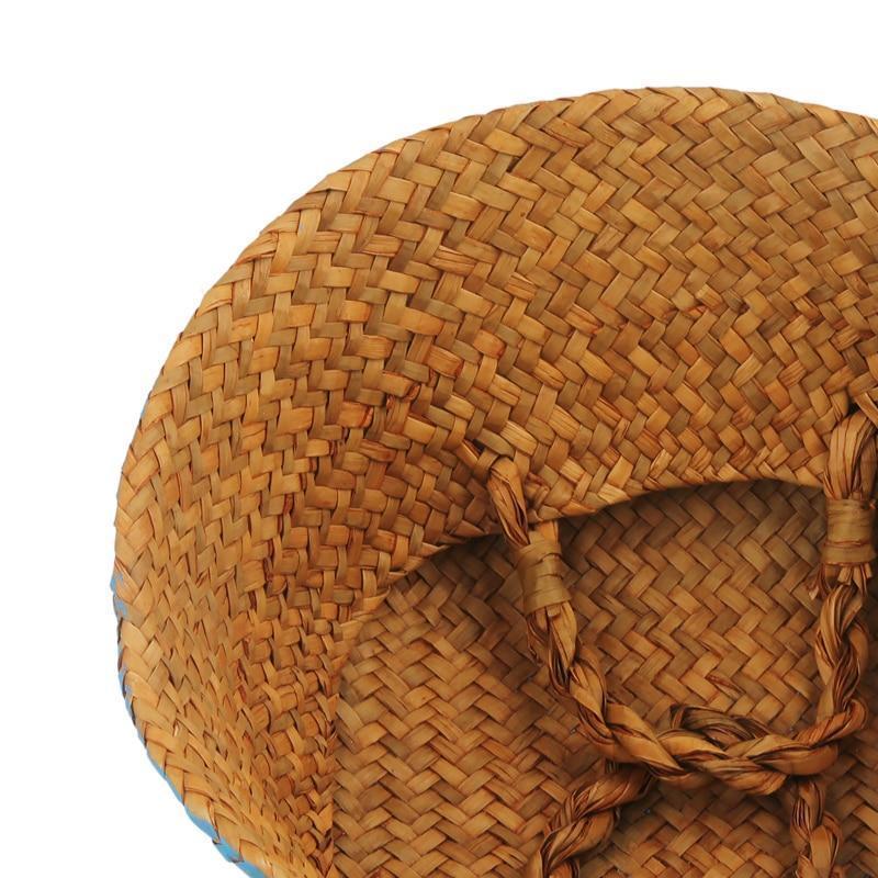 panier à linge tressé en jonc rose
